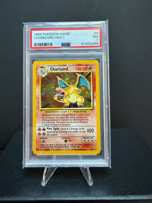 101852869 -  PSA 7 English 1999 Base Set Unlimited Charizard Holo 4/102