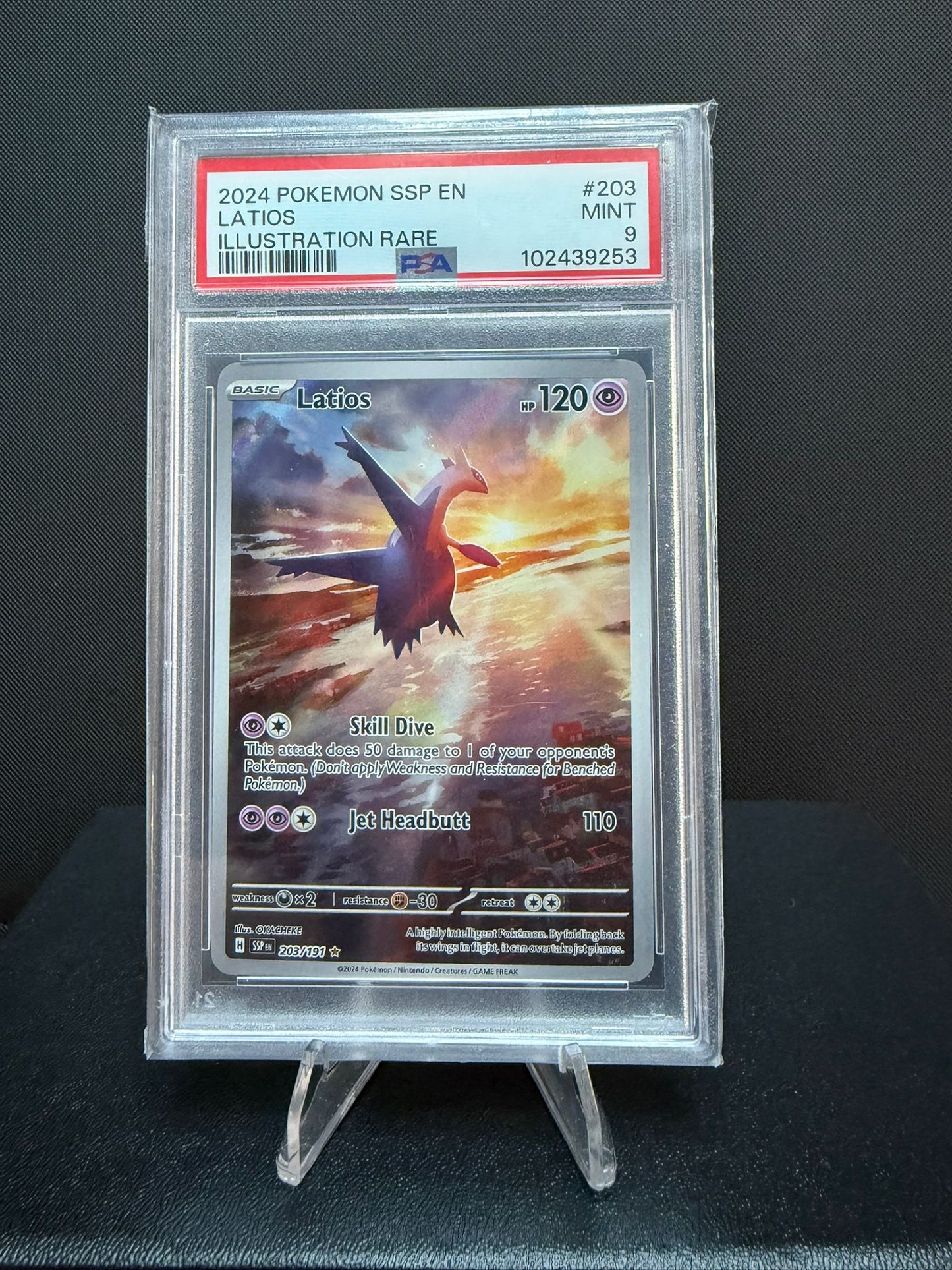 102439253 -  PSA 9 English Surging Sparks Latios 203/191