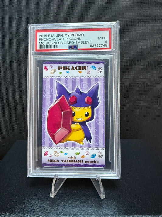 83777748 - PSA 9 2015 Poncho-Wearing Pikachu Mc Business Card - Sableye